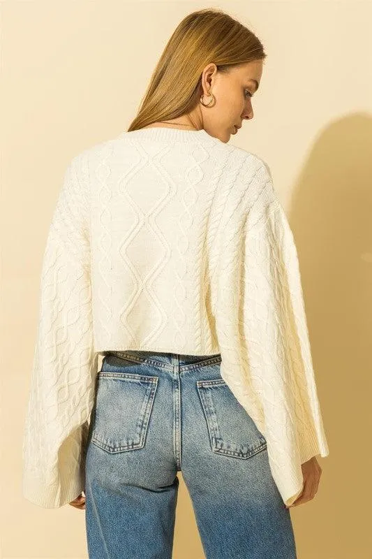 wide sleeve cable knit crop sweater